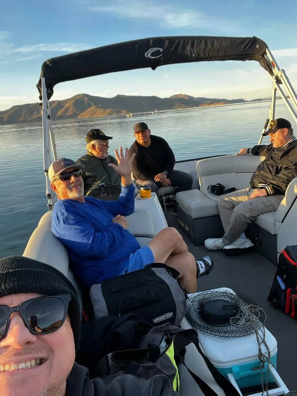 Veterans relaxing together on a boat outing